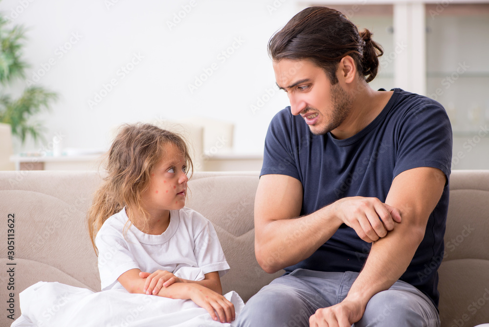Father taking care of his ill daughter Father taking care of his ill daughter