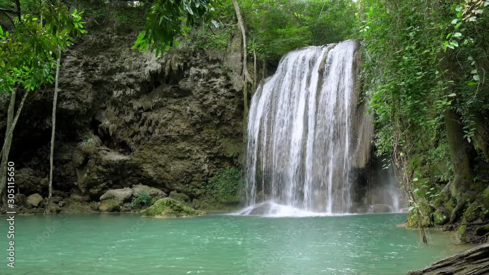 Erawan waterfall level three in National Park, famous tourist destination in Kanchanaburi, Thailand. Erawan waterfall level three in National Park, famous tourist destination in Kanchanaburi, Thailand.