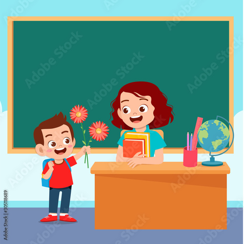 happy cute kid boy give flower to teacher