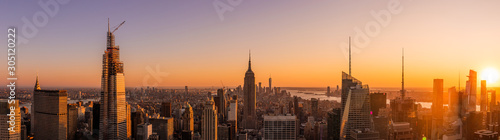 Amazing panorama view of New York city skyscraper during sunset. Stunning view in Manhattan © Thanasith