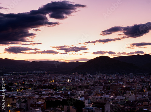aerial view of town at sunset © Miguel Fernandez