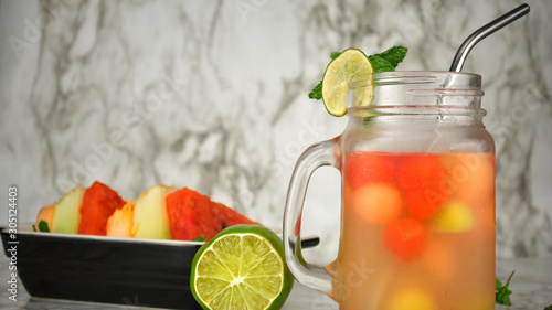 Melon Party Punch Drink with fruits in background