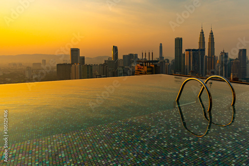 Sunrise by the infinity pool in Kuala Lumpur City Center.