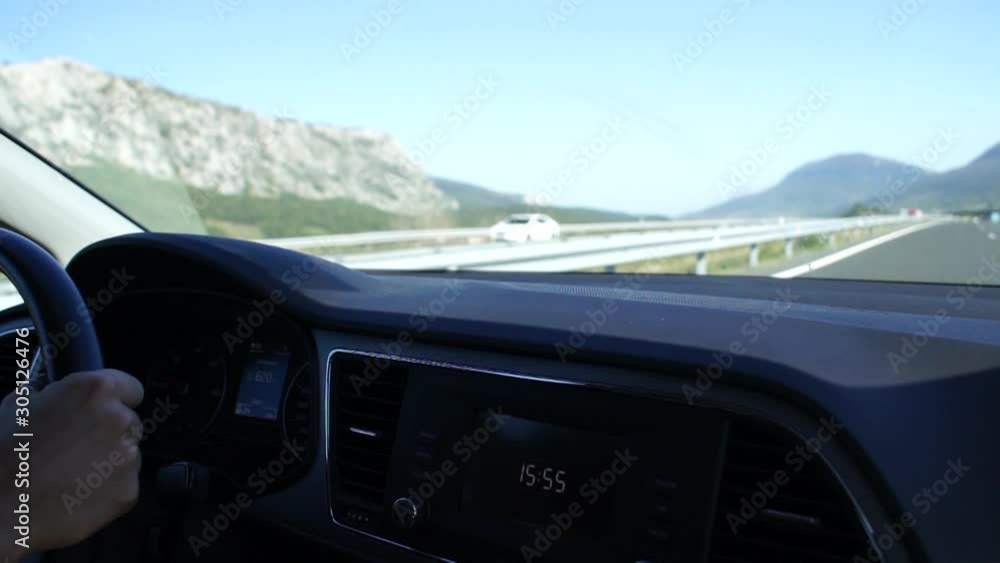 Woman driving a car - point of view Woman driving a car - point of view
