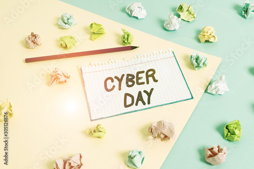 Word writing text Cyber Day. Business photo showcasing marketing term for the Monday after the Thanksgiving in the US Colored crumpled papers empty reminder blue yellow background clothespin © Artur