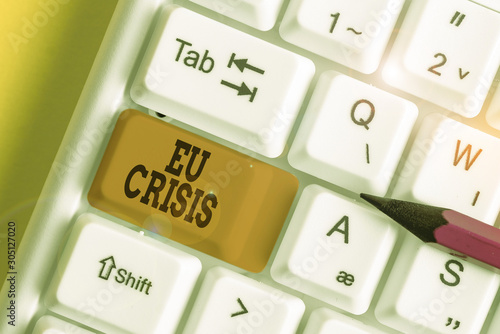 Word writing text Eu Crisis. Business photo showcasing eurozone state unable to repay or refinance their government debt White pc keyboard with empty note paper above white background key copy space