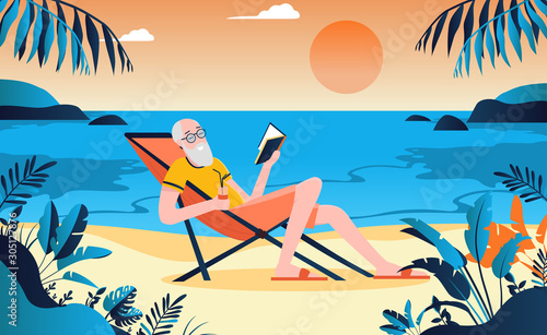 Retired old man on beach enjoying life with a book in hand. Sunny warm background in a tropical environment far away. Silent, peaceful, freedom concept.