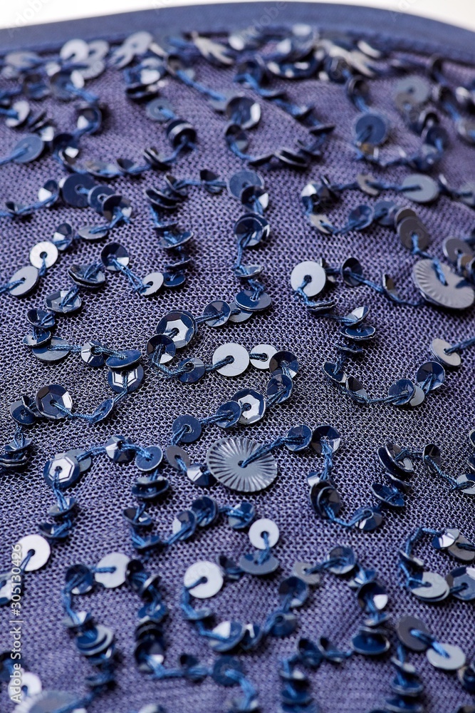 Fabric with sequins and sequins of bright colors. Fashion glitter fabric, sequins. Shiny surface Fabric with sequins and sequins of bright colors. Fashion glitter fabric, sequins. Shiny surface