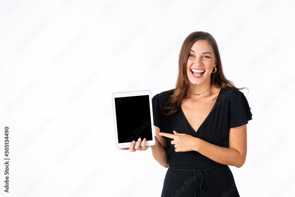 Young women in black dress hand holding tablet with white background Young women in black dress hand holding tablet with white background