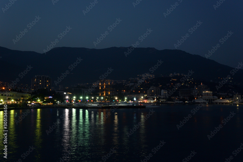 View of the evening embankment of the city of Yalta