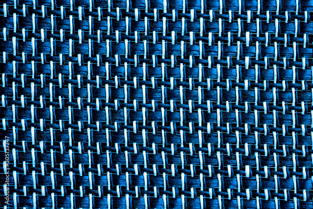 Fototapeta premium Background image of grid pattern on blue cloth background