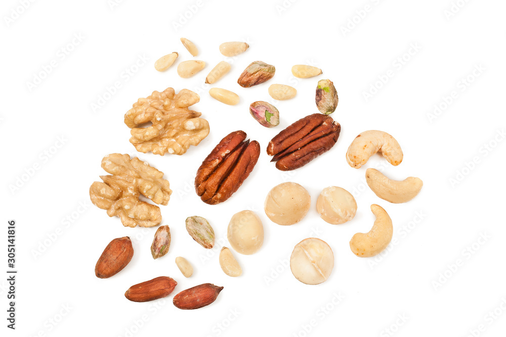 Background of different nuts. Pecan, cashew, macadamia, pistachio, pine nuts, walnuts isolated on a white background. Top view. Background of different nuts. Pecan, cashew, macadamia, pistachio, pine nuts, walnuts isolated on a white background. Top view.