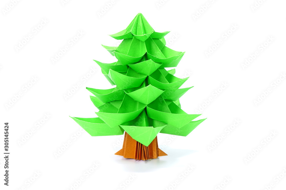 Origami paper art : Christmas tree isolated on white background, for greeting season of Christmas and New year. Origami paper art : Christmas tree isolated on white background, for greeting season of Christmas and New year.