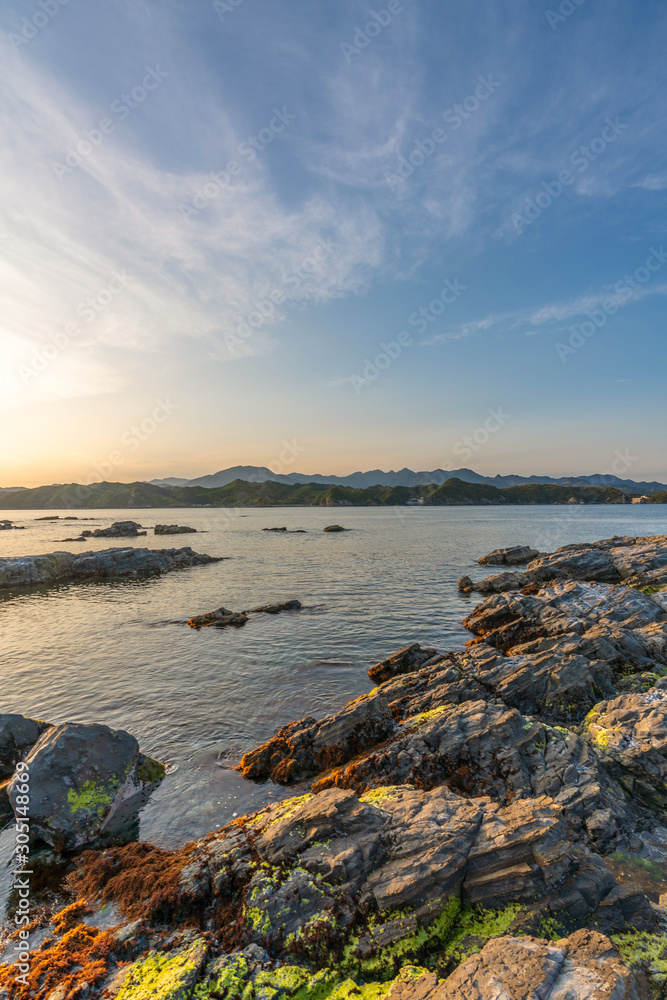 beautiful twilight sunset with blue sky high peak mountains mist fog green forest  park ocean sea idea for backpacker guiding backpacking camping campfire relax hiking  long weekend at Wakayama Japan