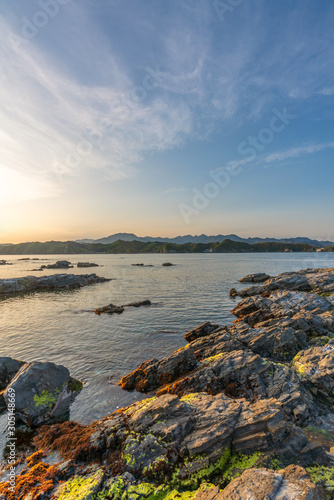 beautiful twilight sunset with blue sky high peak mountains mist fog green forest park ocean sea idea for backpacker guiding backpacking camping campfire relax hiking long weekend at Wakayama Japan