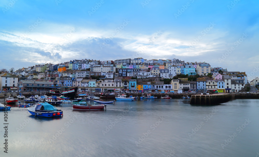 Colorful buildings in a small fishing town of Brixham in the county of Devon, in the south-west of England.