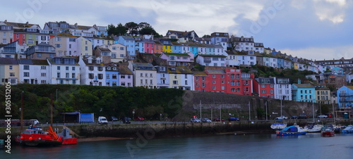 Colorful buildings in a small fishing town of Brixham in the county of Devon, in the south-west of England.