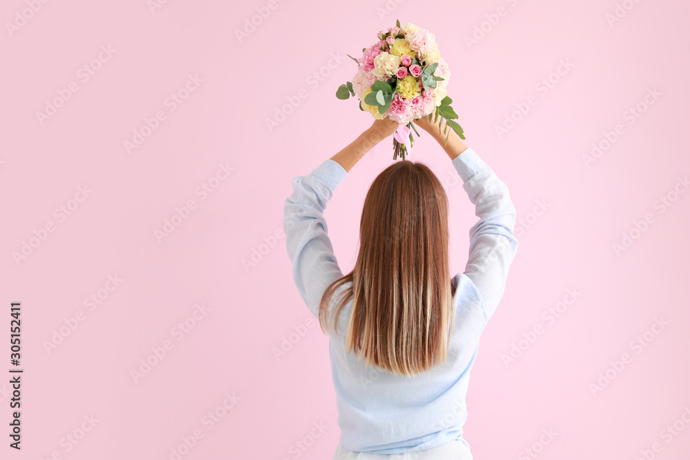 Beautiful young woman with bouquet of carnation flowers on color background