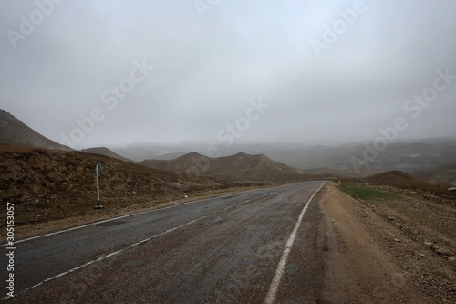 Scenic misty mountain road in Dagestan view, Russia