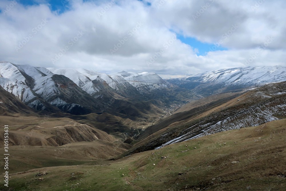 Amazing Caucasus mountains view by spring and snow, Dagestan, Russia Amazing Caucasus mountains view by spring and snow, Dagestan, Russia