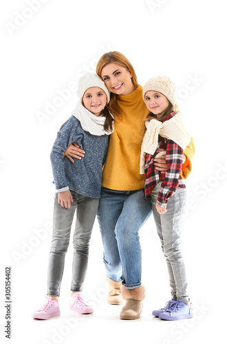 Happy family in autumn clothes on white background