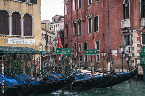 Venice  Veneto  Italy - 15.11.2019  View of gondolas and typical Venetian houses and architecture. Beautiful and romantic Italian city on water. 