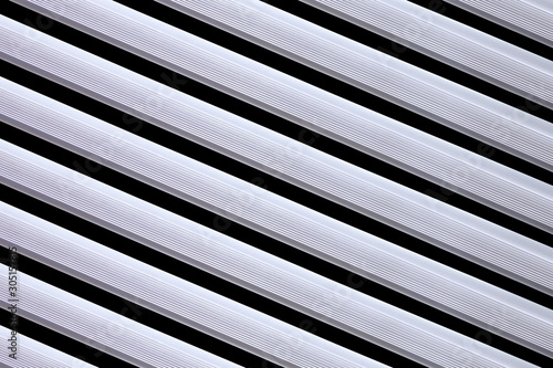 Aluminium pipes horizontal black background