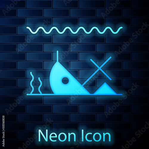 Glowing neon Sunken ship at the bottom of the sea icon isolated on brick wall background. Vector Illustration