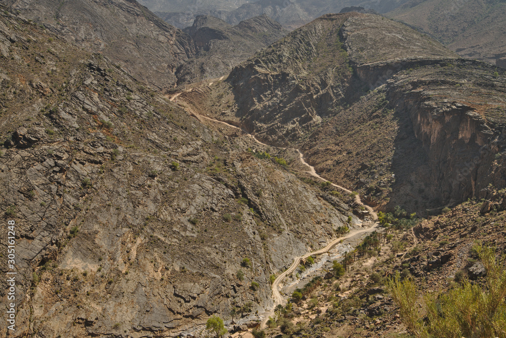 Scenic mountain road in rocky landscape of Sultanate of Oman