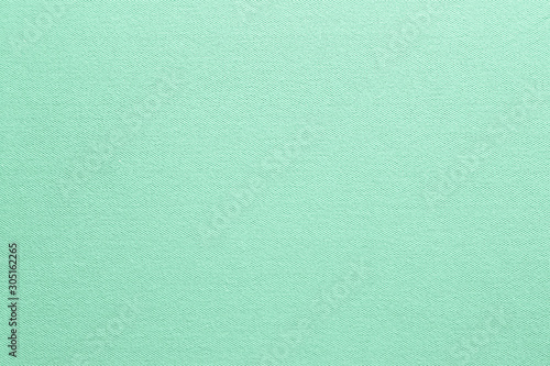 Texture of turquoise fabric, closeup