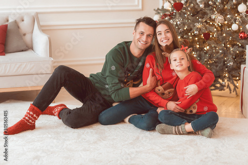 Happy young family on Chris...