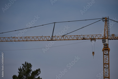 crane on background of blue sky