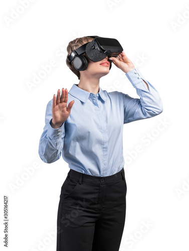 Businesswoman gesturing in VR glasses, isolated