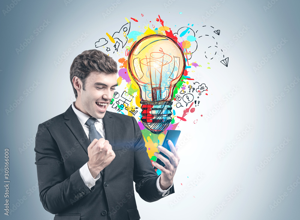 Happy businessman with smartphone and his big idea Happy businessman with smartphone and his big idea