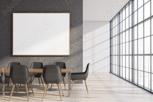 Concrete and white dining room with poster