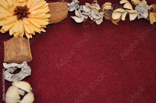 Fall decoration dried trinkets and diy frame on bordoux surface