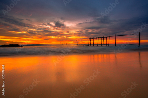 The background of a cloudy sky, colorful like a storm, and rain later, with blurring of wind and sea together, is a phenomenon that occurs naturally.