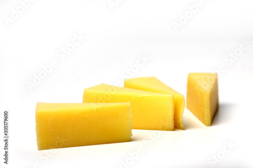 sliced Edam cheese isolated on white background