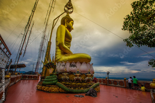 Background Large Buddha statues built on high mountains in Thailand  Wat Tham Sua   people and tourists come to visit the beauty and make merit always in Krabi.