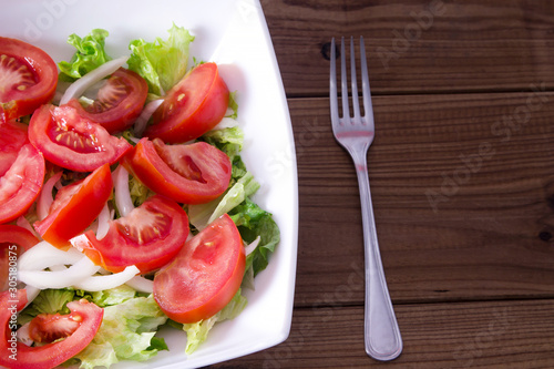 lettuce and tomato salad, diet and food concept