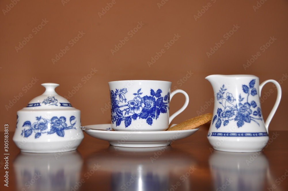 Elegant vintage coffee porcelain drink set on wooden table
