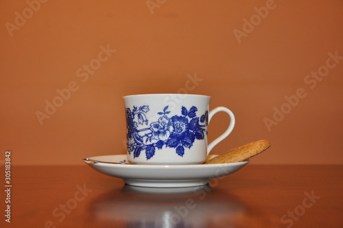 Elegant vintage coffee porcelain drink set on wooden table