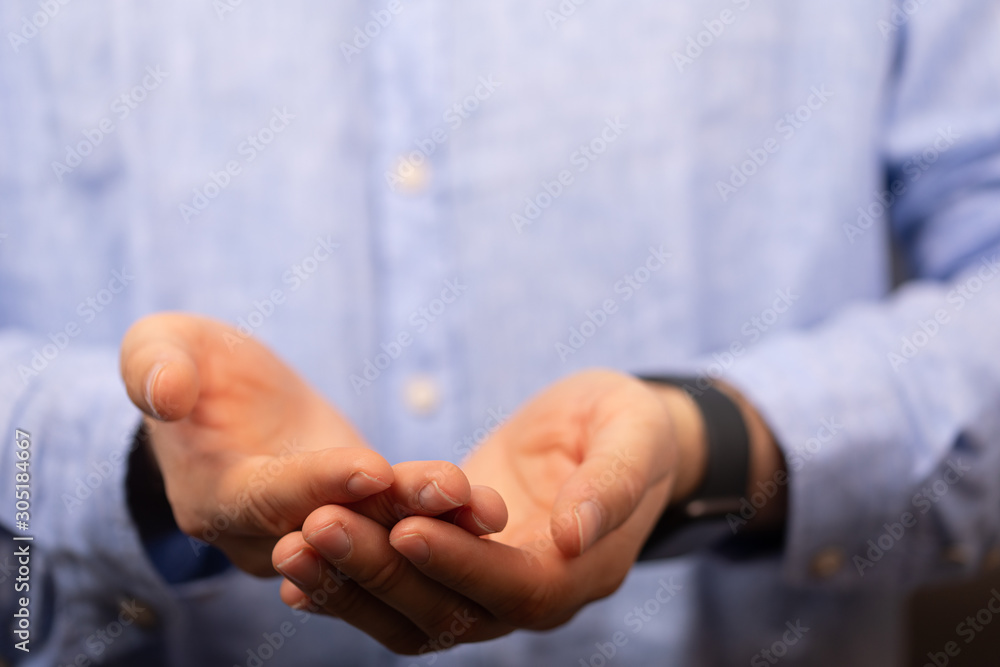 Fototapeta premium Businessman without head holding something without theme