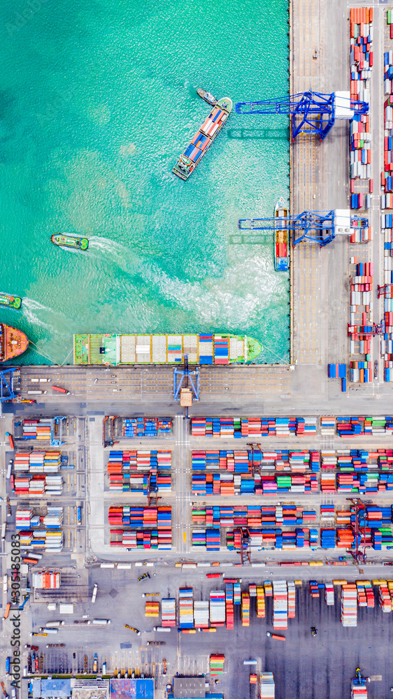 Top view of Deep water port with cargo ship and containers. It is an import and export cargo port where is a part of shipping dock and export products worldwide - obrazy, fototapety, plakaty 