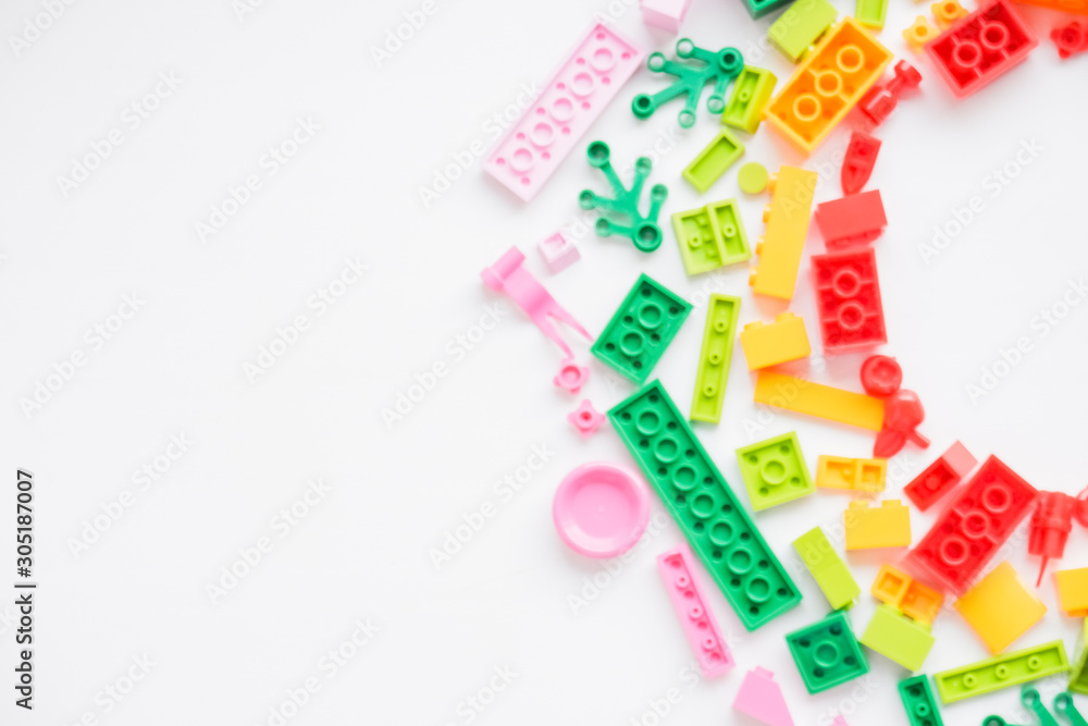 Fototapeta premium Russia, saint-petersburg, 02 august 2019.Bright Color Building Blocks Isolated on White. selective focus.Copy space.kindergarten play room.Educational toys for children.