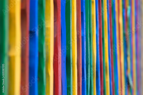 Colored wood fence. A wood fence made if colorful sticks