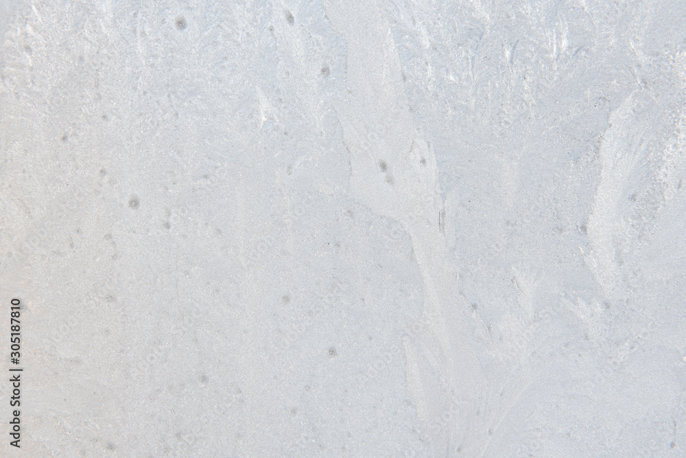 Background. The texture of the frost. Texture of ice. Frost on the glass. Winter has come. Background. The texture of the frost. Texture of ice. Frost on the glass. Winter has come.