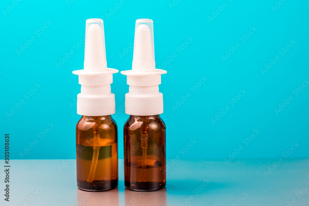 Two bottles with a spray for the nose Two bottles with a spray for the nose