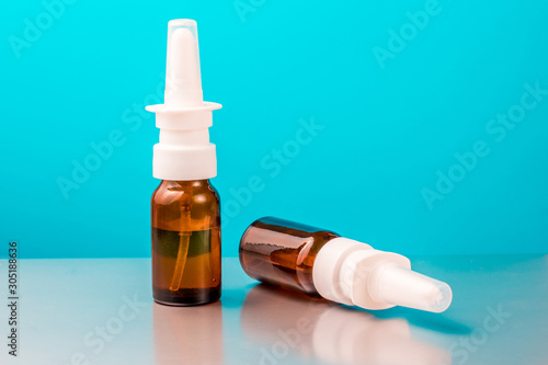 Two bottles with a spray for the nose