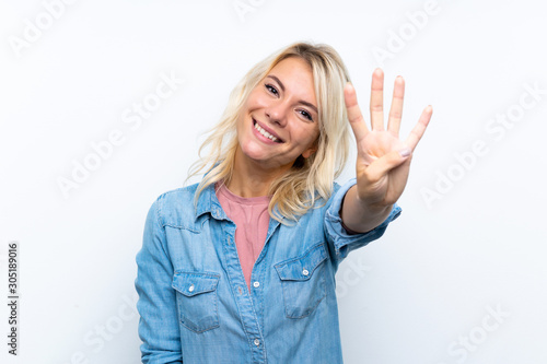 Young blonde woman over isolated white background happy and counting four with fingers